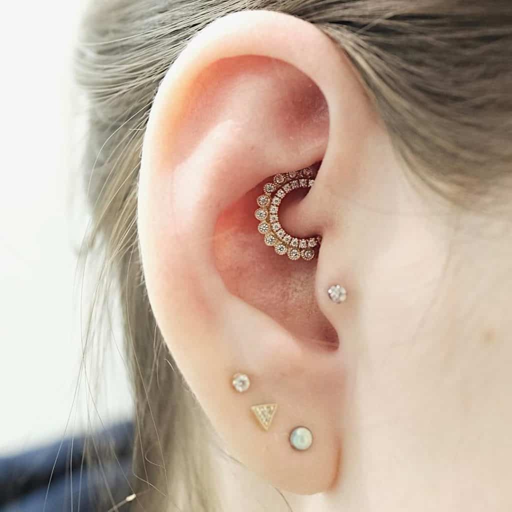 The Curated Ear Personally Stylizing Multiple Ear Piercings